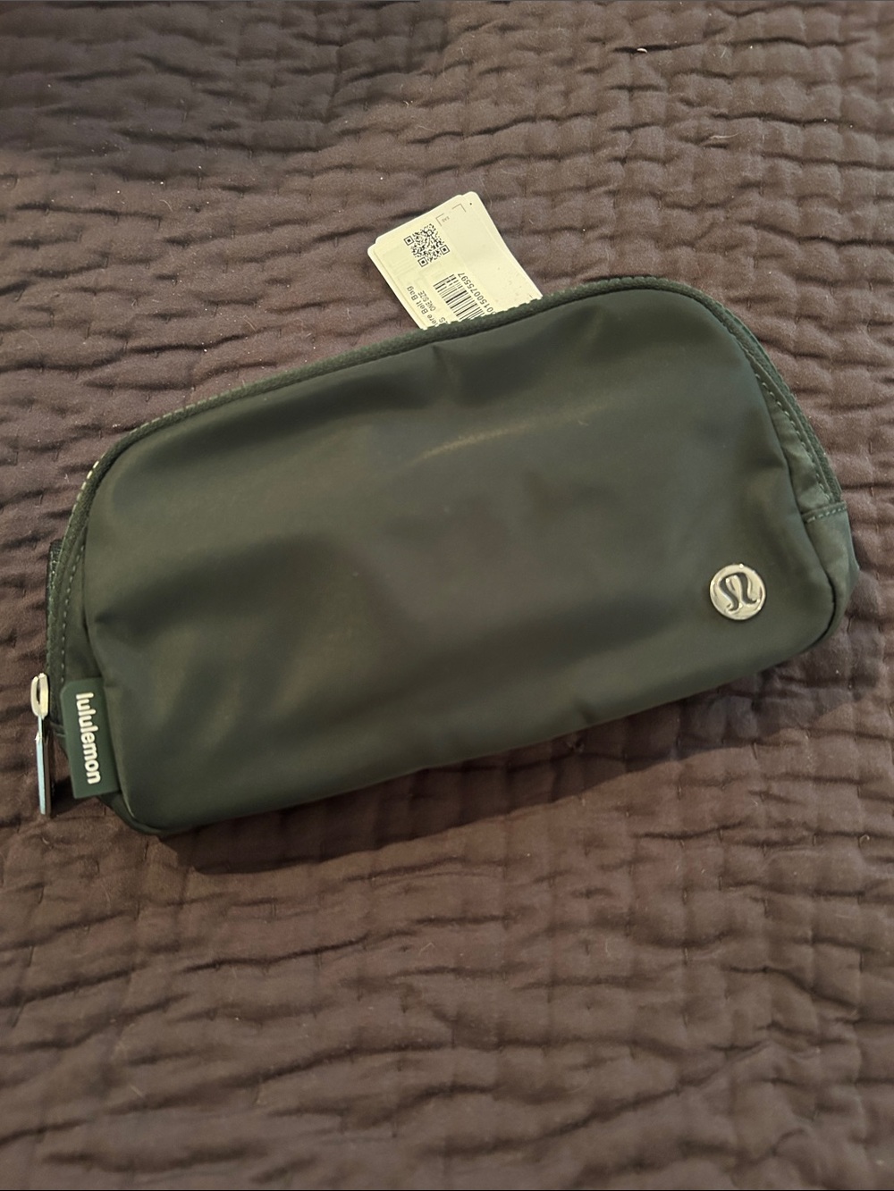 lululemon athletica Mini Zip Pouch in Dark Green with Silver Logo